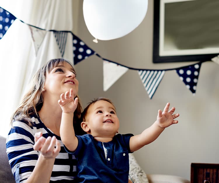 Mother holding her baby