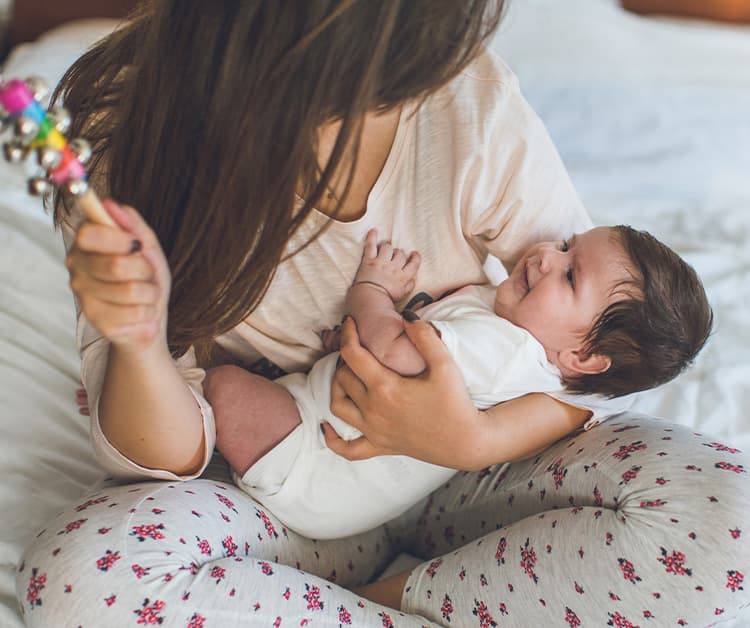 Mother holding her baby